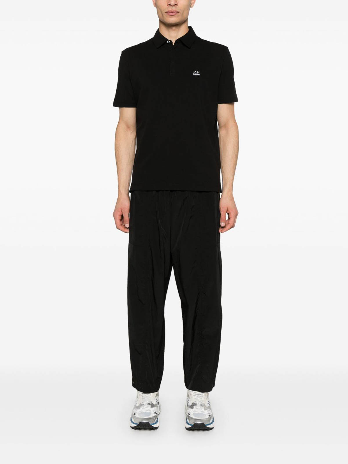 Black Polo Shirt In Stretch Cotton Pique 18CMPL165A005263W999 (C.P. Company / ポロシャツ ) | C.P. Company (シーピーカンパニー)(1)