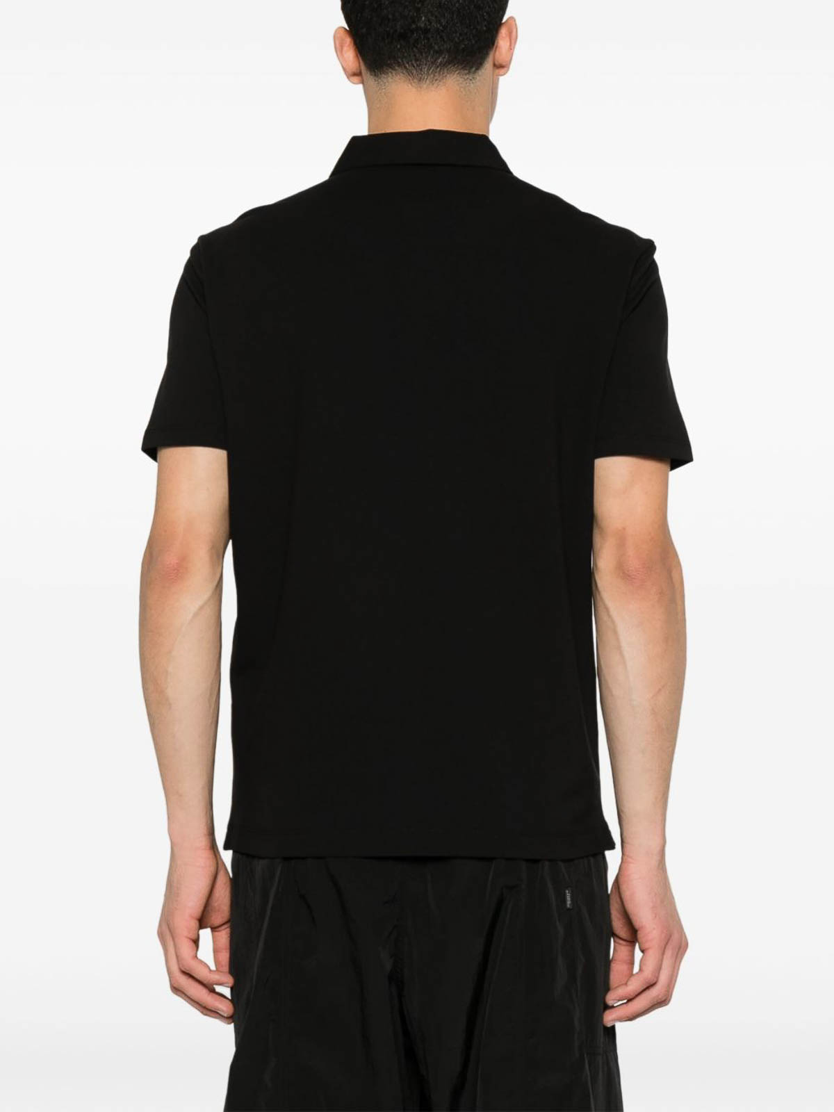 Black Polo Shirt In Stretch Cotton Pique 18CMPL165A005263W999 (C.P. Company / ポロシャツ ) | C.P. Company (シーピーカンパニー)(2)