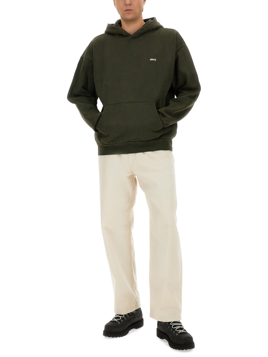 SWEATSHIRT WITH LOGO 112470194PIGMENTROSIN (OBEY / スウェット・フーディー ) | OBEY (オベイ)(1)