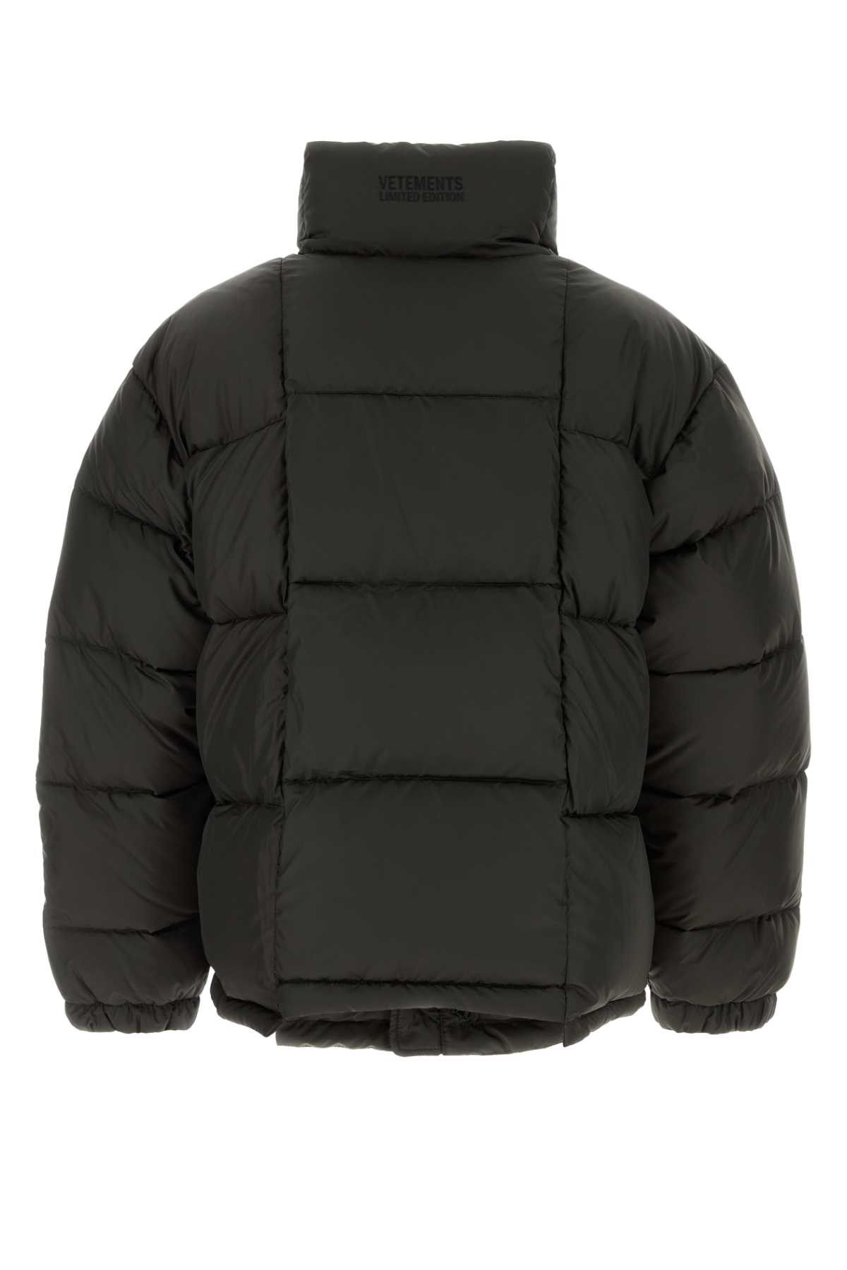 Dark brown polyester down jacket UA65JA103BBLACKOUT (VETEMENTS / ダウンジャケット・コート ) | VETEMENTS (ヴェトモン)(1)